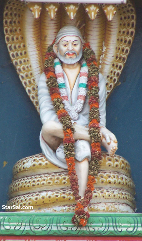 Shirdi Saibaba beautifully sitting on the Snake - NagaSai